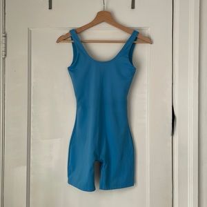 Girlfriend Collective light blue bike unitard